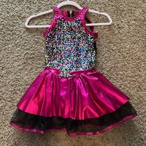 Girls Revolution fuchsia metallic and sequin costume.